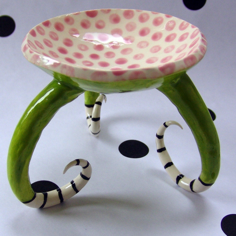pink polka dots on ceramic dish :) with long striped legs