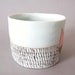 porcelain cup with translucent bottom