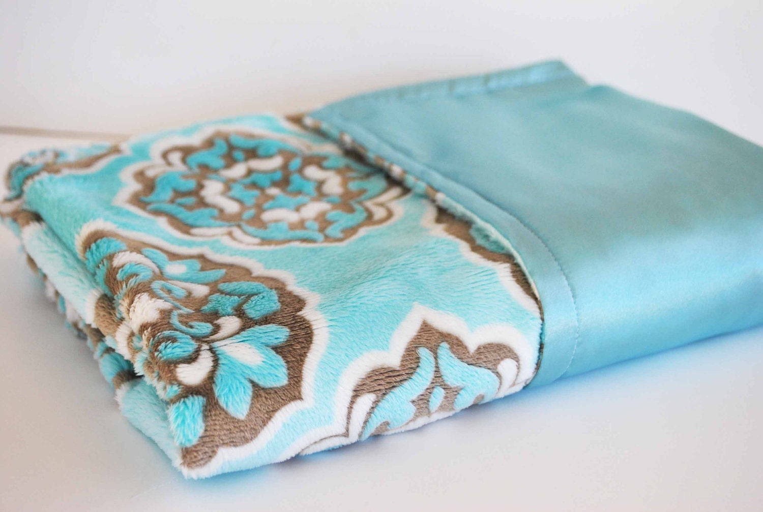 MINI BABY BLANKET....  Embossed sky blue  soft  minky with satin baby blanket..........Comforting fabrics for baby