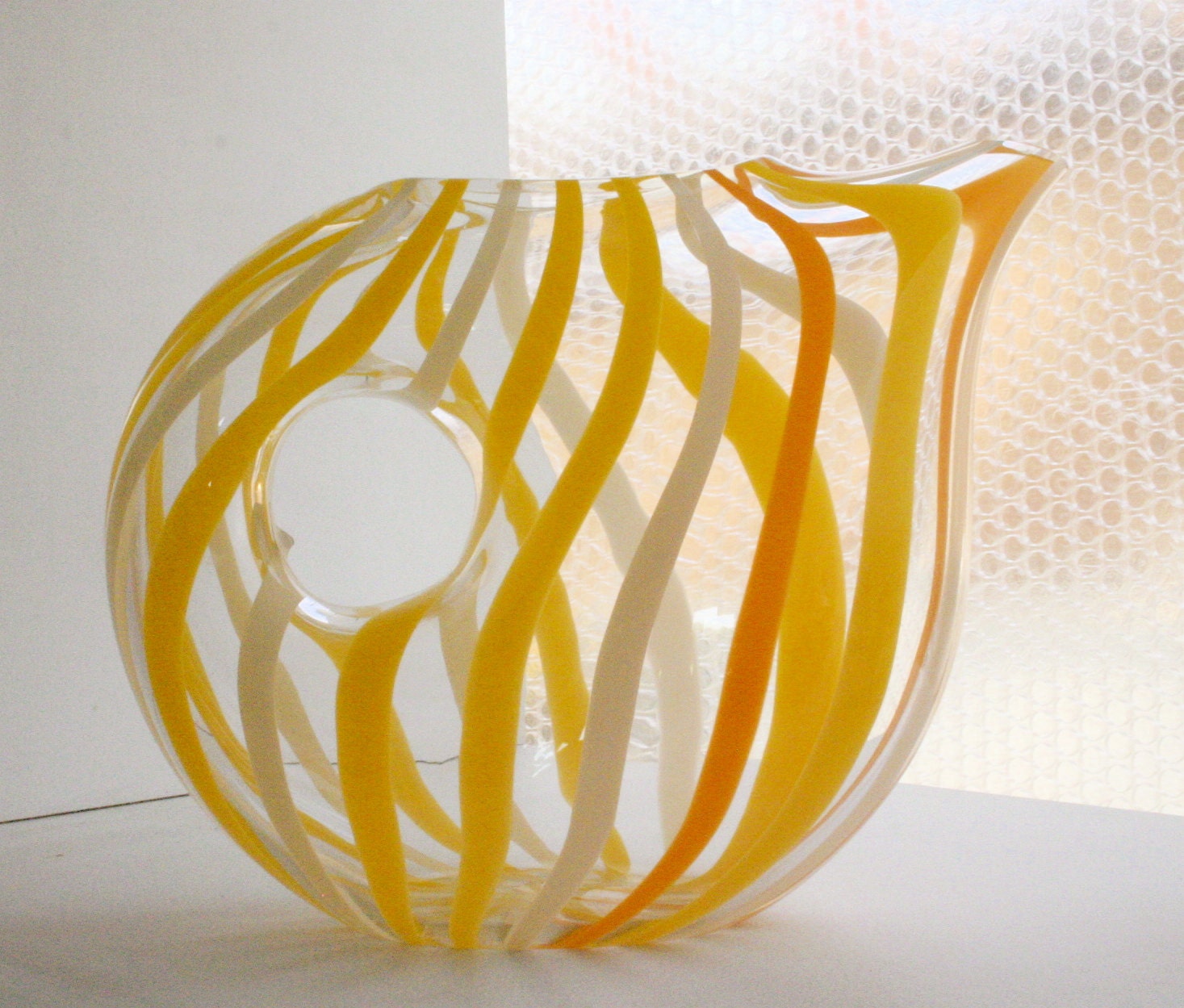 Hand blown glass pitcher