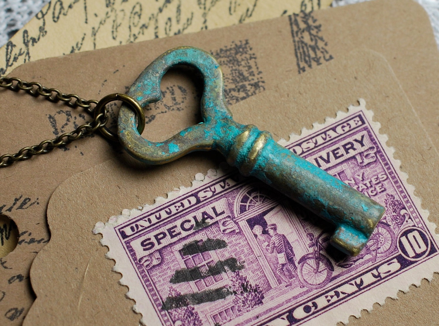 antique skeleton key necklace... heart shape with a verdigris patina