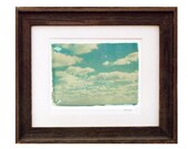11x14 polaroid transfer of blue sky and clouds framed in 16x20 barnwood