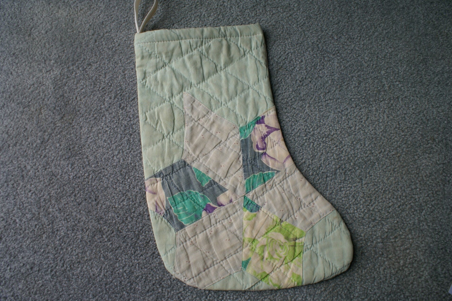 Handmade Christmas stocking from a vintage quilt