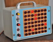 FINALLY- A 49-node all-neon hysteresis relaxation oscillator for the nursery, den, or office.