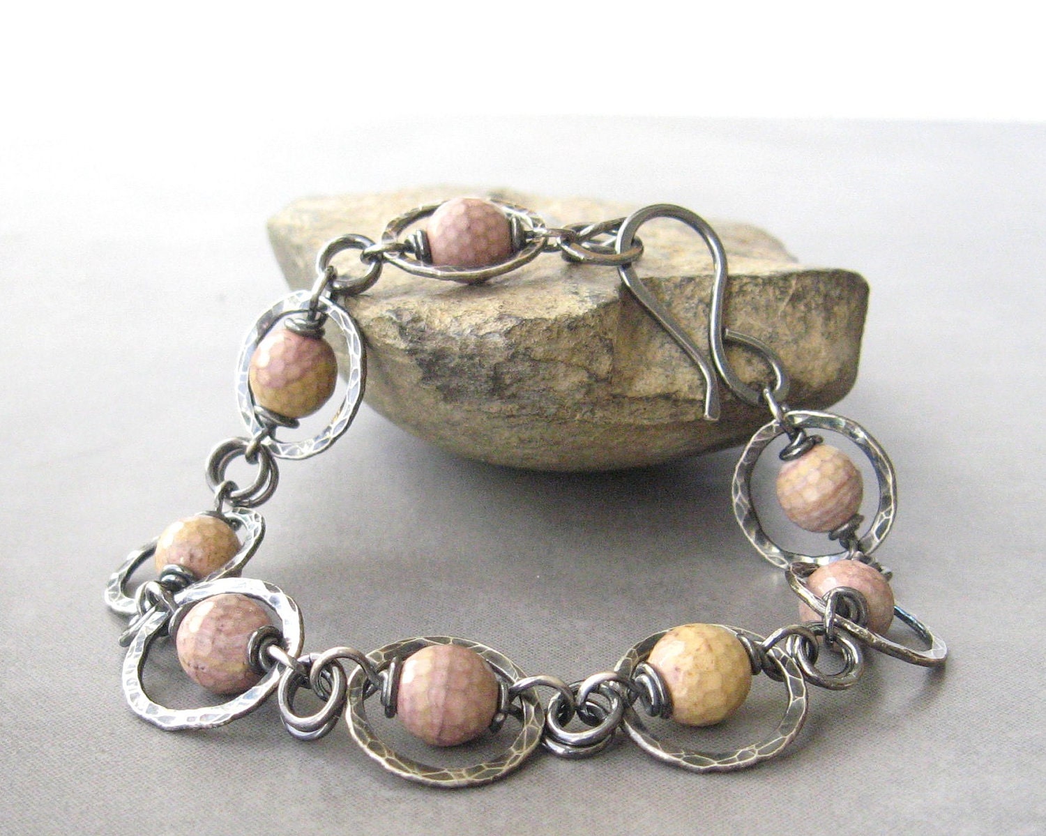 pink rhodonite bracelet with sterling wire wrap and metalwork - theBeadAerie