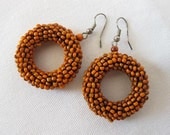 Beaded hoops GYPSY rustic beaded earrings. Burnished terracotta. 2 inches long