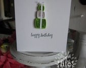 Quilled Green present