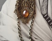 Eyeglass Necklace with Burnt Orange Vintage Glass Setting