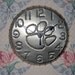 Paw Print Tin Punch Wall Clock
