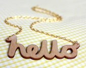 Hello Wooden Necklace. Laser cut in eco friendly birch wood. Gold or silver plated chain.