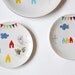 SALE Lovely set of a large cake plate and three smaller ones