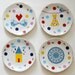 Super festive serving set of one very large and four smaller (cake/breakfast) plates