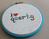 Completed I Heart QWERTY Cross Stitched In Blue Hoop