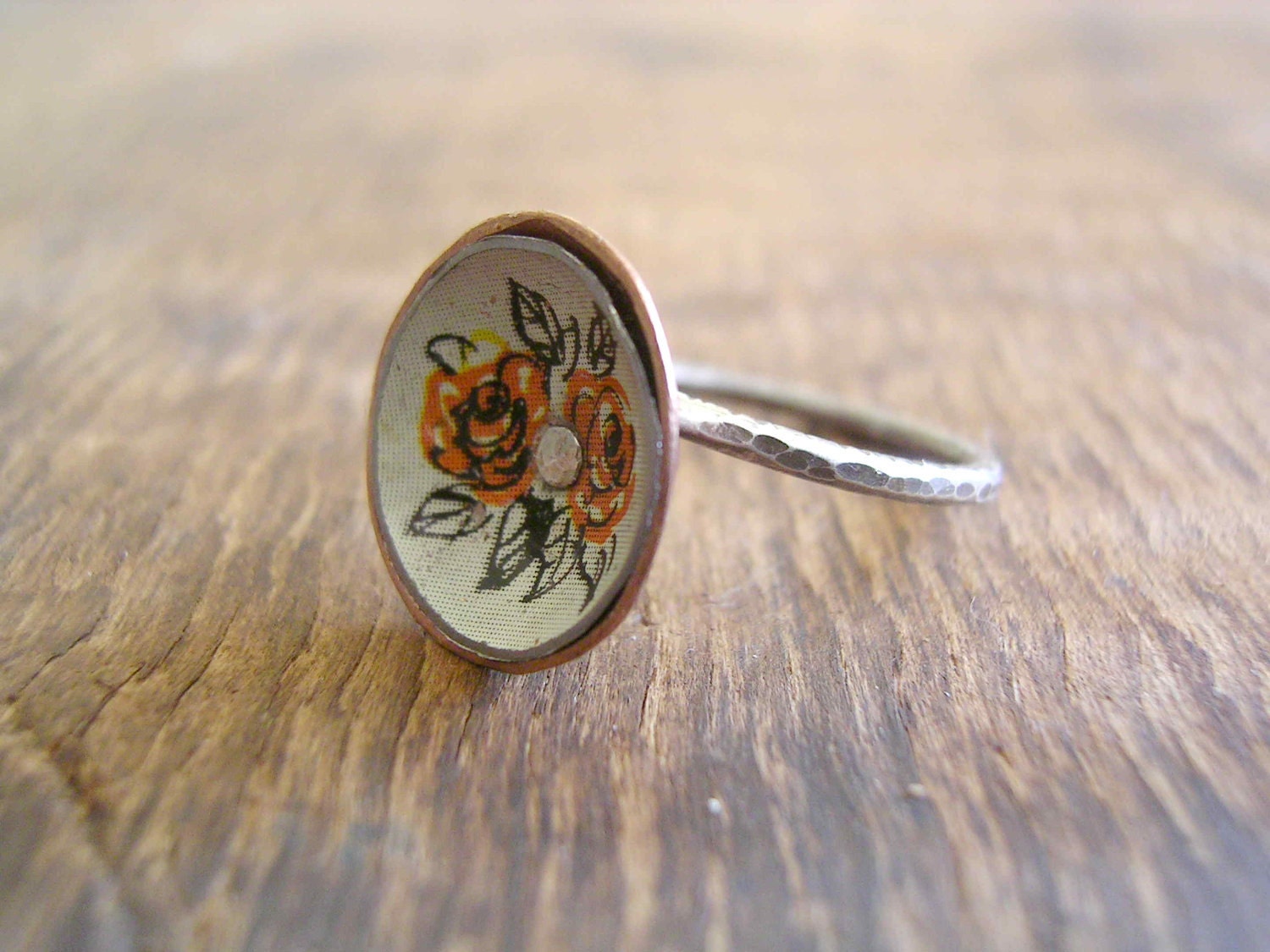 Adjustabe Orange Blossom ring, of recycled tins, silver and copper.