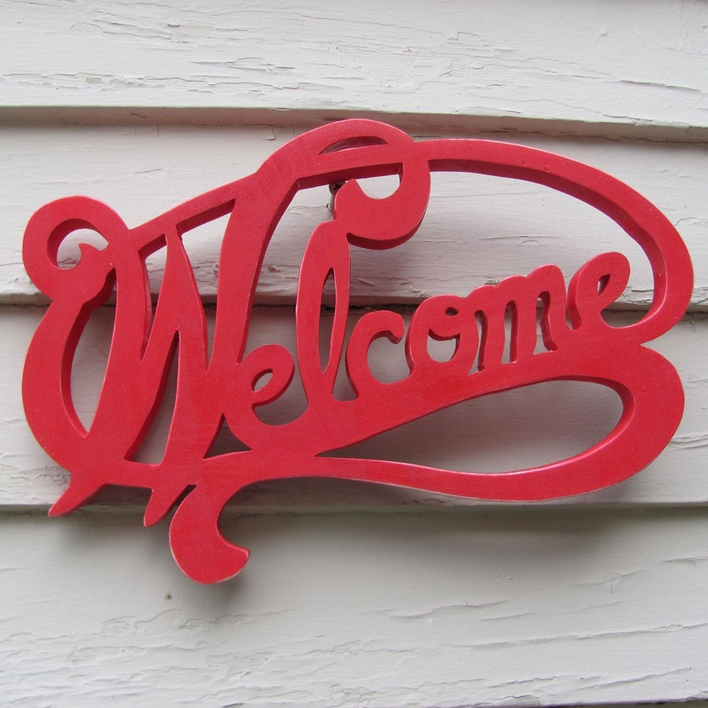 wooden fretwork welcome sign
