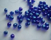 10 grams of Japanese Fringe Beads - Transparent Rainbow Cobalt Color
