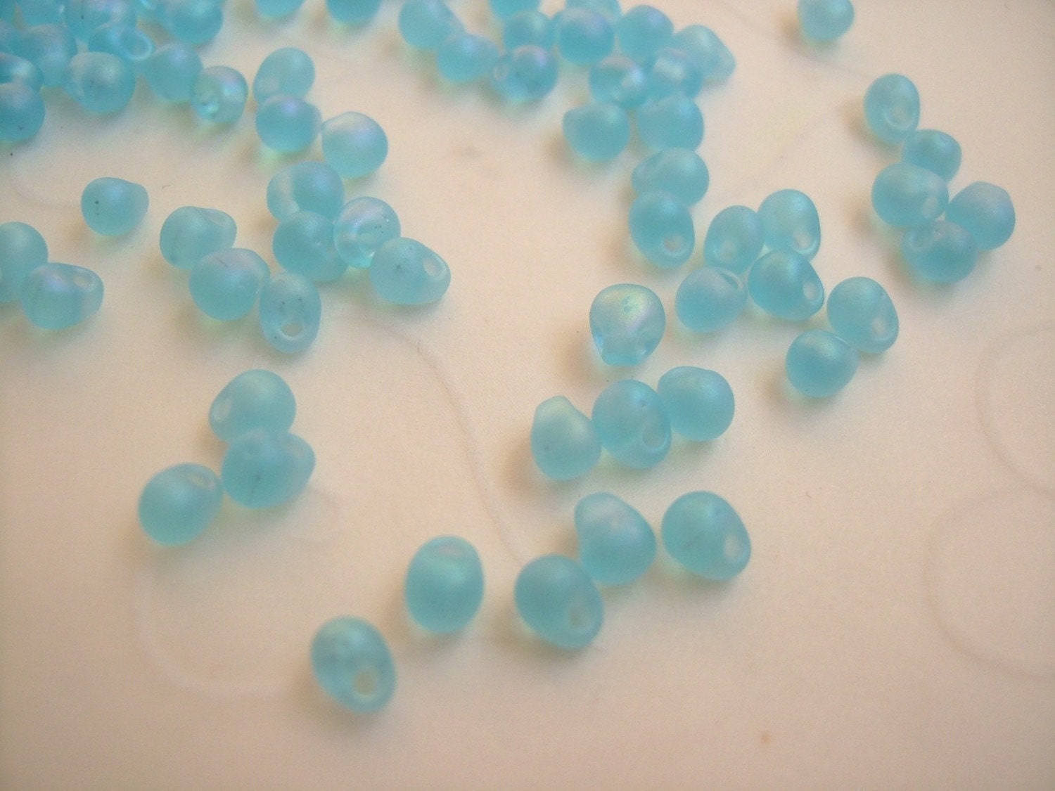 10 grams of Japanese Fringe Beads - Matte Rainbow Light Blue Color