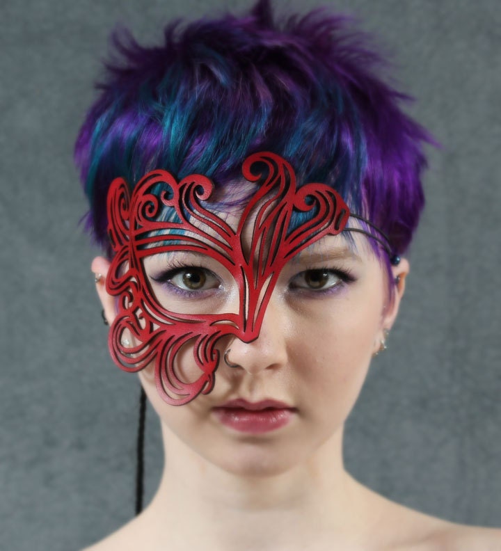 Bemused cut out leather mask in red