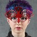 Bird mask in red leather