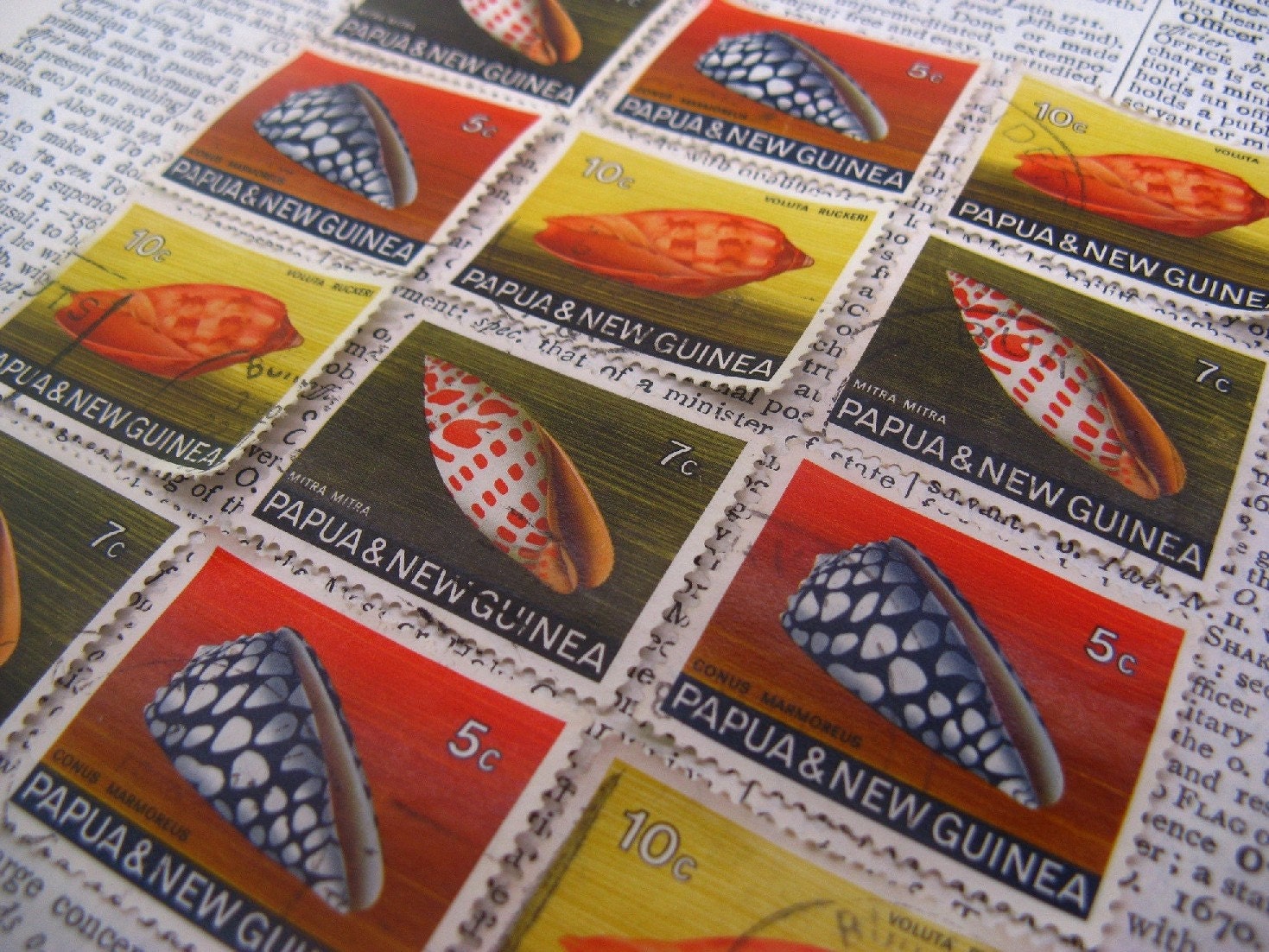Striking PNG shells - 12 mixed - vintage postage stamp ephemera