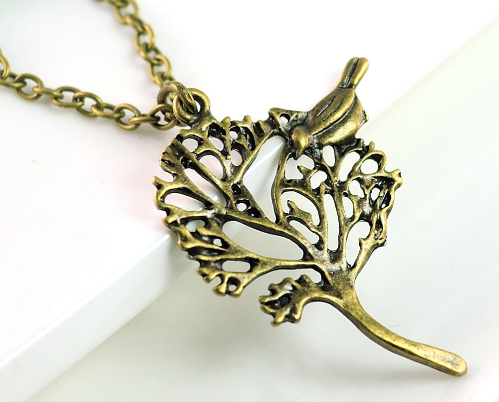 Tree Necklace Bird and Tree Earthy Tree . Metal Necklace Charm Necklace . Canada Necklace with Bird sitting on top  of the tree