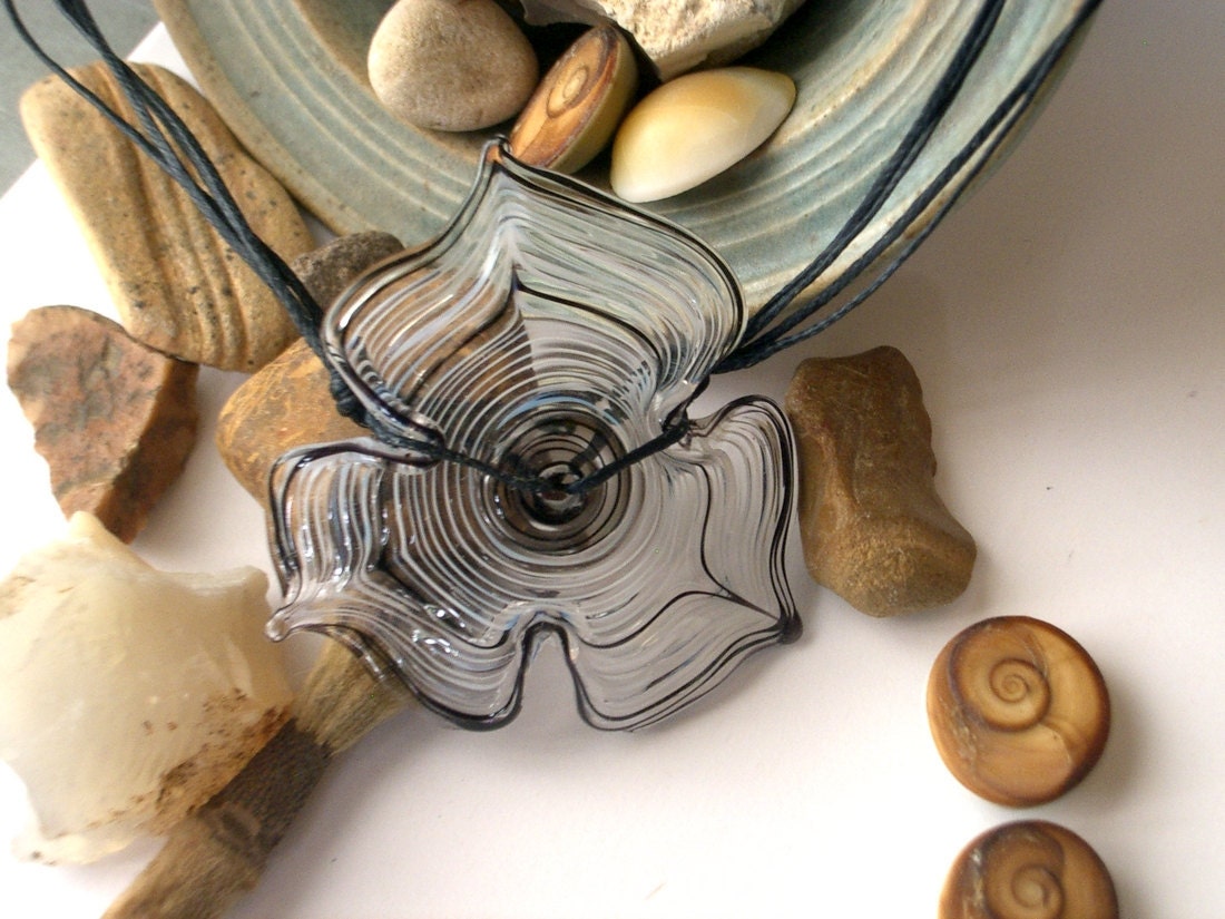 Black and white single flower disc necklace, Lampwork glass bead hand made by Yasmin Sivan