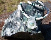 Glass Mushroom Pendant on Puka Shell Necklace