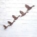 Flock ceramic wall art set of three flying ducks sizes C D and E