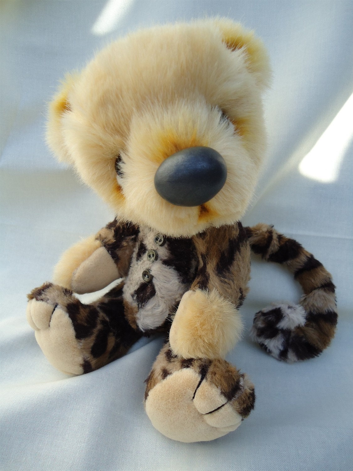 SALE: Lucas, a 8.5 inch bear cub in leopard PJ's