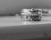 Five Sterling Silver Rings in a Stack
