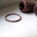 Hand twisted solid gold stacking ring