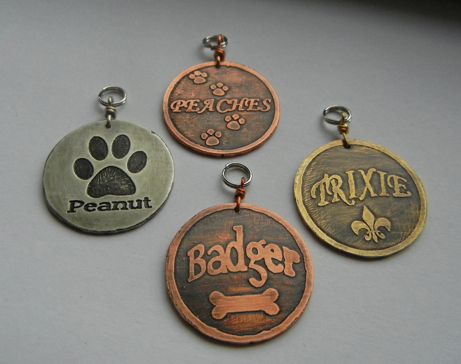 Bone, Fleur de lis, paw prints dog pet id tag. 1" custom etched brass, copper, nickel dog tag.