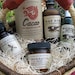a gift for an awesome man in your life, our shaving soap, aftershave, salve, spray, and delicious drinking chocolate