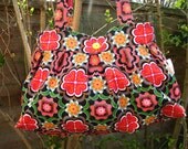 Tamsin handbag in funky retro print with vintage button
