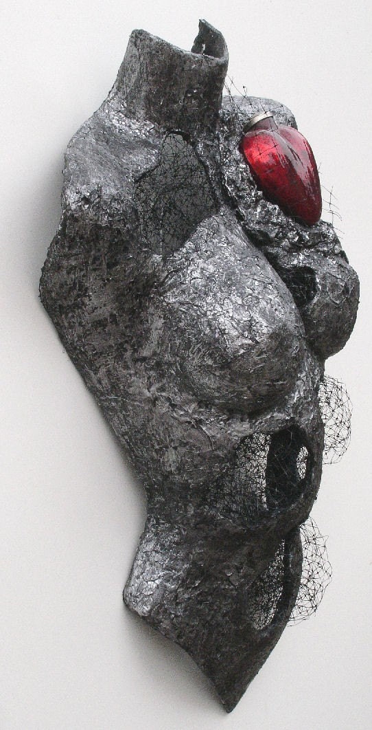 ENTANGLED mixed media female torso in silver and black with red glass heart