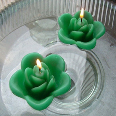 12 Kelly green floating rose wedding candles for table centerpiece and reception decor.