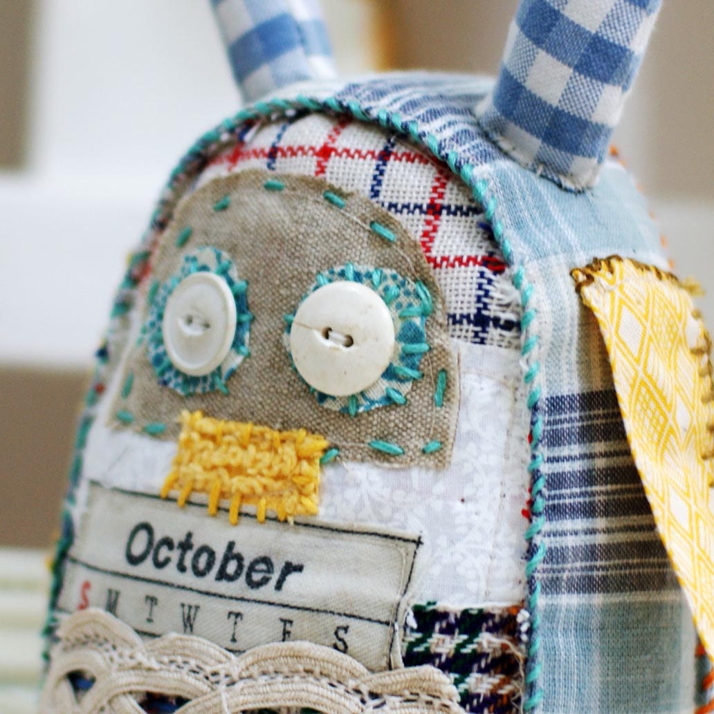 October  a vintage fabric  linen teatowel handstitched scrap prim softie doll