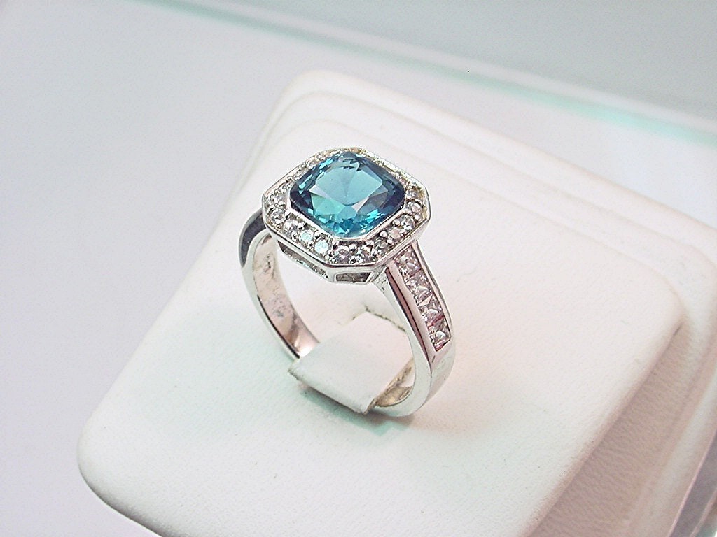 7x7mm London Blue Topaz 1.98 carats set in 14K white gold and diamond ring .60 carats C77 0285