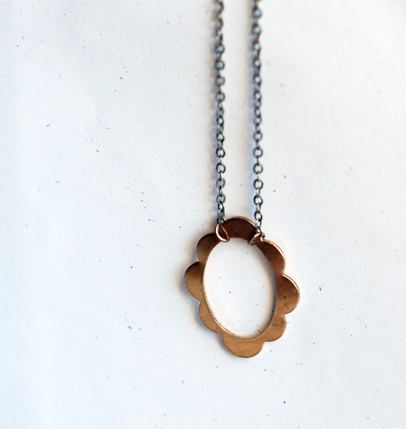 mirror reflection necklace - with a solid raw brass scalloped frame
