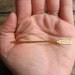vintage c. 1960s set of 25 gold metal arrow cocktail picks // made in England (LAST SET)