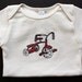 Organic Cotton Tricycle Onesie - blue or red