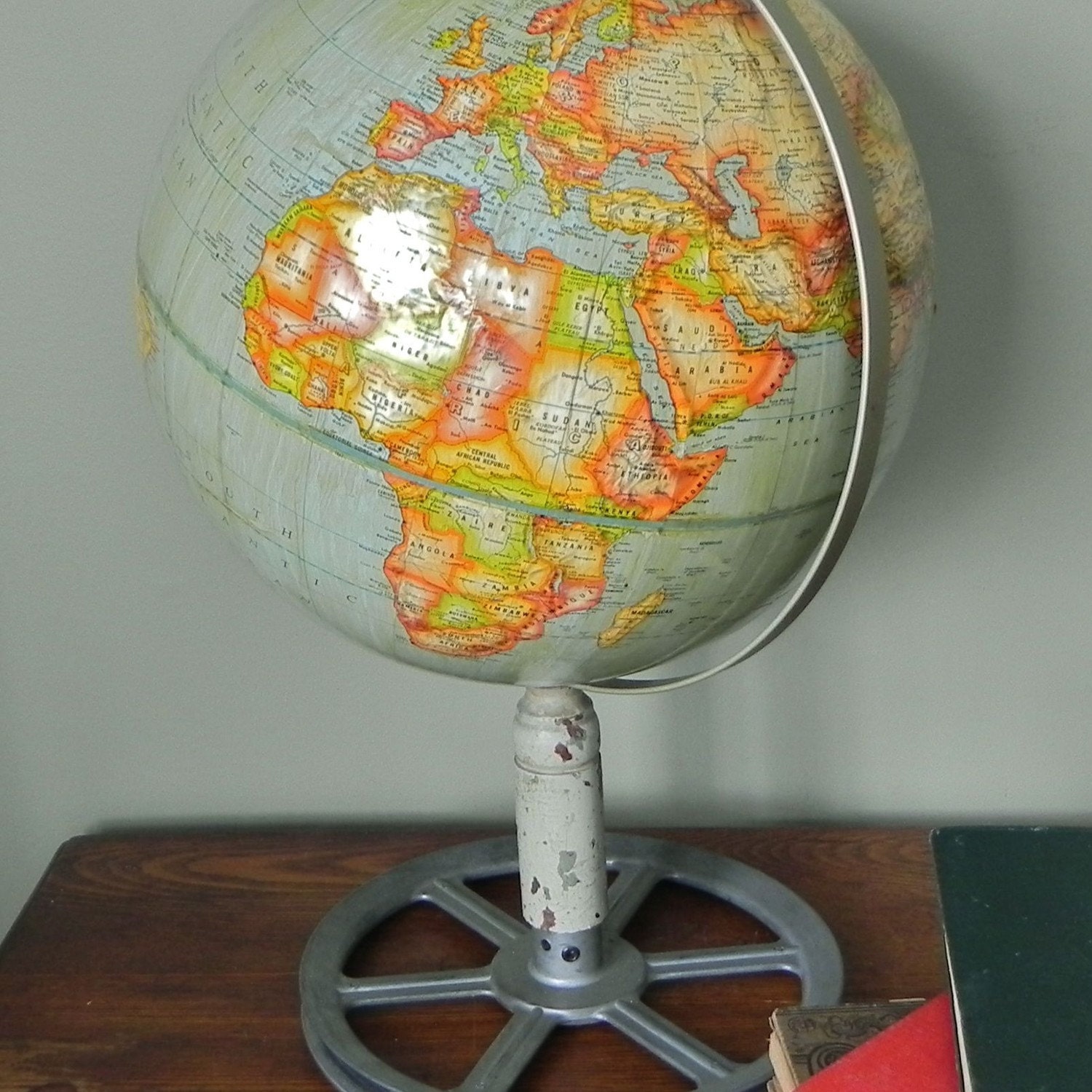 Vintage globe on industrial stand
