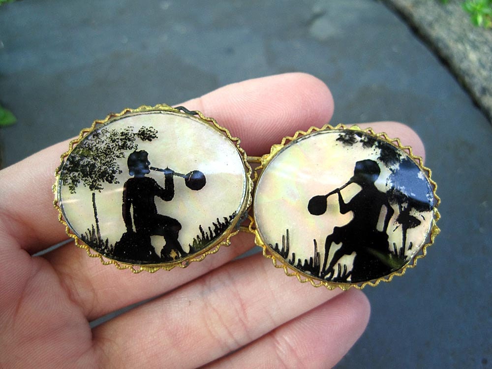 RESERVED Stunning Buckle Silhouettes over Mother of Pearl