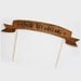 As seen in MARTHA STEWART WEDDINGS wood cake flag banner
