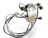 star- sterling silver and 14K white gold ring with rutilated quartz and imperial topaz