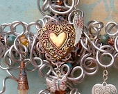 Vintage Style Hearts and Wings Silver Wall Cross