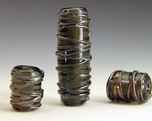 Lampwork bead set in Grey and Metallic black drizzle. Focal with earring pair