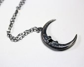 owl moon. owl talon crescent necklace.