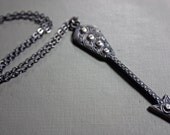 the wounding. ornate arrow necklace. sterling silver.