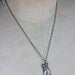 the medium. lily dale spiritualism necklace.